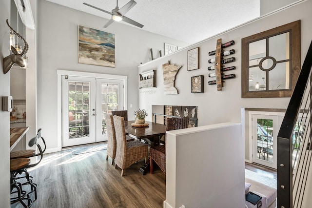 15657 Fish Point Rd SE, Prior Lake, MN 55372 - dining space with french doors, plenty of natural light, wood finished floors, ceiling fan, and lofted ceiling