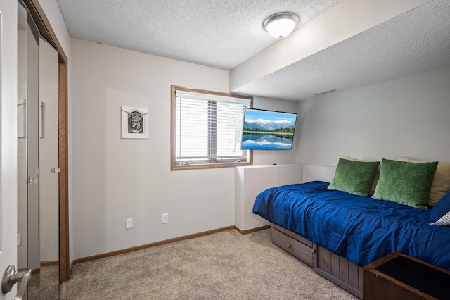 15657 Fish Point Rd SE, Prior Lake, MN 55372 - carpeted bedroom featuring a textured ceiling and baseboards