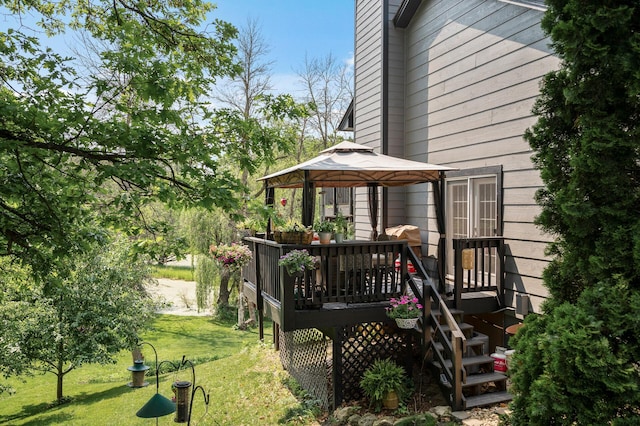 15657 Fish Point Rd SE, Prior Lake, MN 55372 - wooden deck featuring a gazebo and a yard