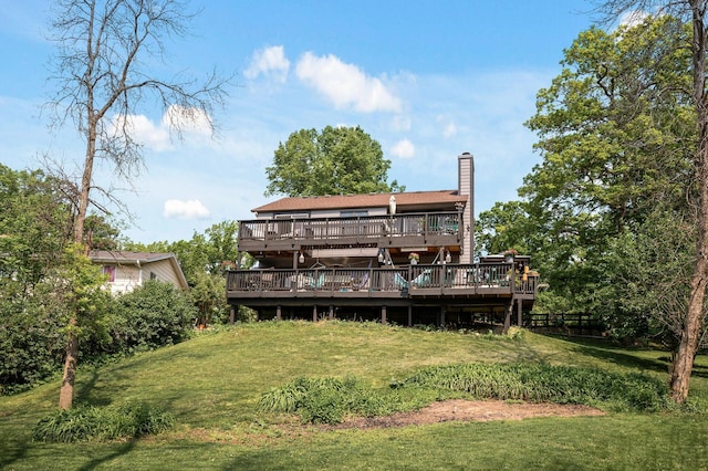 15657 Fish Point Rd SE, Prior Lake, MN 55372 - back of house featuring a deck, a yard, and a chimney