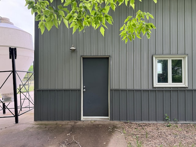 25809 Virgo St NE, Oxford Twp, MN 55079 - property entrance featuring board and batten siding