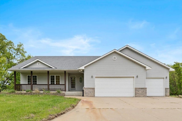 25809 Virgo St NE, Oxford Twp, MN 55079 - view of front of house featuring a garage, driveway, a porch, brick siding, and a front yard