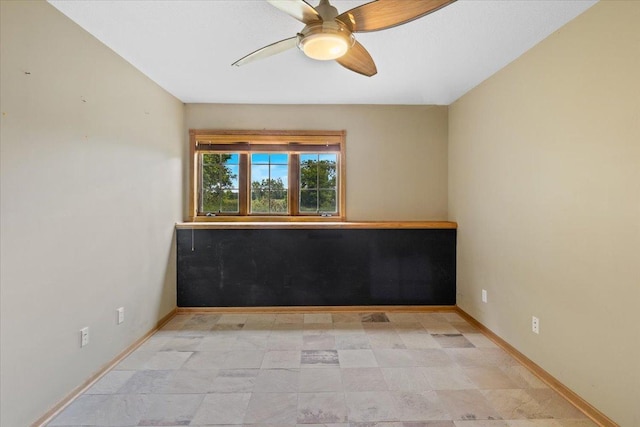 25809 Virgo St NE, Oxford Twp, MN 55079 - spare room with ceiling fan and baseboards