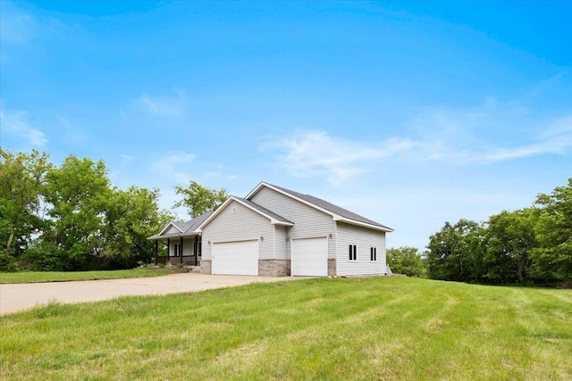 25809 Virgo St NE, Oxford Twp, MN 55079 - view of front of house featuring a garage, a front lawn, driveway, and stone siding