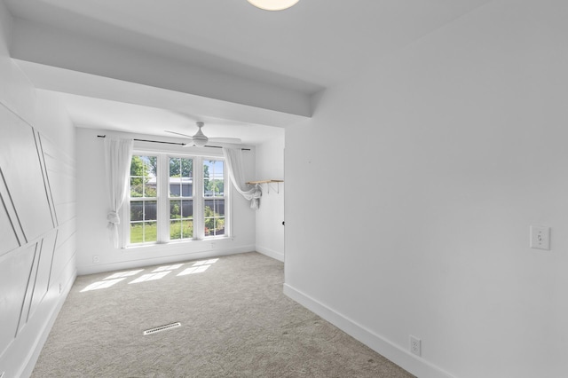 7537 Wentworth Ave, Richfield, MN 55423 - unfurnished room with carpet, baseboards, and a ceiling fan