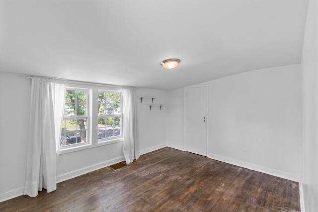 7537 Wentworth Ave, Richfield, MN 55423 - empty room with wood finished floors and baseboards
