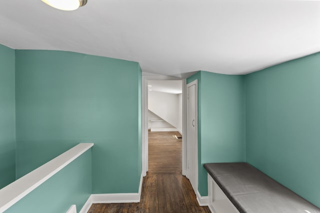 7537 Wentworth Ave, Richfield, MN 55423 - corridor with wood finished floors, baseboards, and an upstairs landing