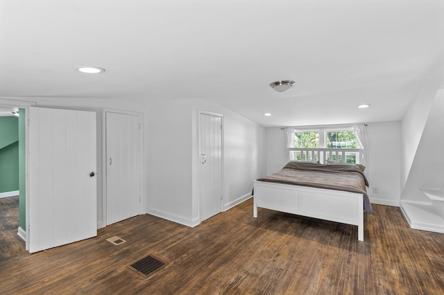 7537 Wentworth Ave, Richfield, MN 55423 - bedroom with wood finished floors, baseboards, vaulted ceiling, and recessed lighting