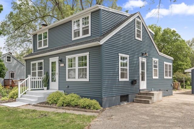 7537 Wentworth Ave, Richfield, MN 55423 - view of front of house with a chimney and a shingled roof