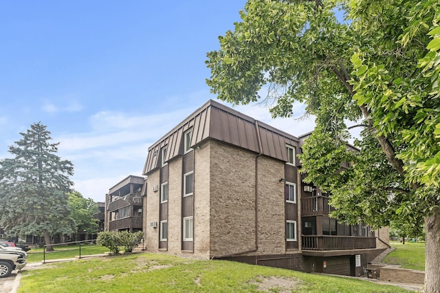 4207 Lakeside Ave N Unit 328, Brooklyn Center, MN 55429 - view of building exterior with a garage