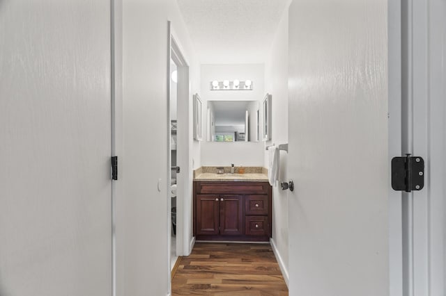 4207 Lakeside Ave N Unit 328, Brooklyn Center, MN 55429 - bathroom with wood finished floors and vanity
