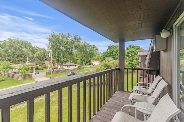 4207 Lakeside Ave N Unit 328, Brooklyn Center, MN 55429 - wooden deck with a yard and view of wooded area