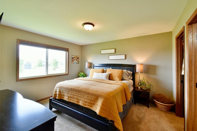 1756 34th St NE, Sauk Rapids, MN 56379 - carpeted bedroom with baseboards