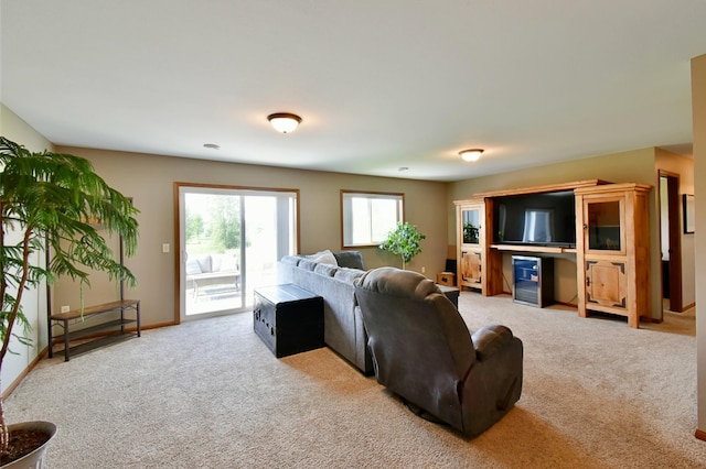 1756 34th St NE, Sauk Rapids, MN 56379 - carpeted living room featuring baseboards
