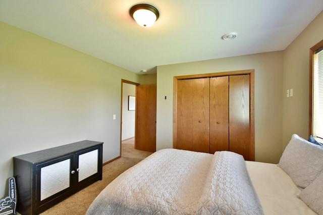 1756 34th St NE, Sauk Rapids, MN 56379 - carpeted bedroom featuring a closet and baseboards