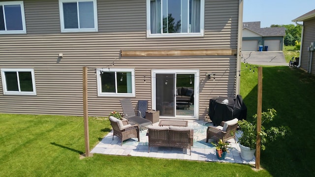 1756 34th St NE, Sauk Rapids, MN 56379 - rear view of property featuring a patio, a yard, and an outdoor hangout area