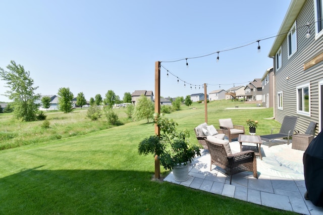 1756 34th St NE, Sauk Rapids, MN 56379 - view of grassy yard featuring a patio, a residential view, and an outdoor living space
