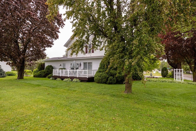402 Main St, Racine, MN 55967 - view of front of home with a deck and a front lawn