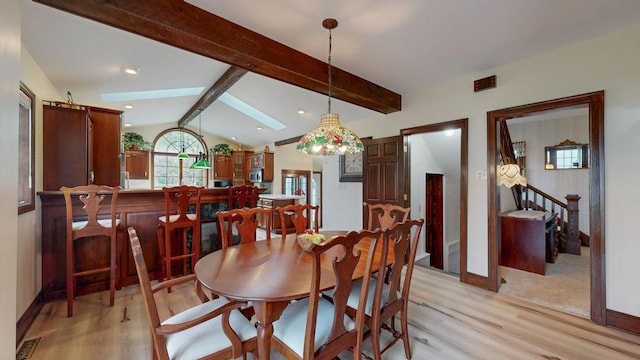 402 Main St, Racine, MN 55967 - dining room with light wood-style floors, baseboards, and stairs