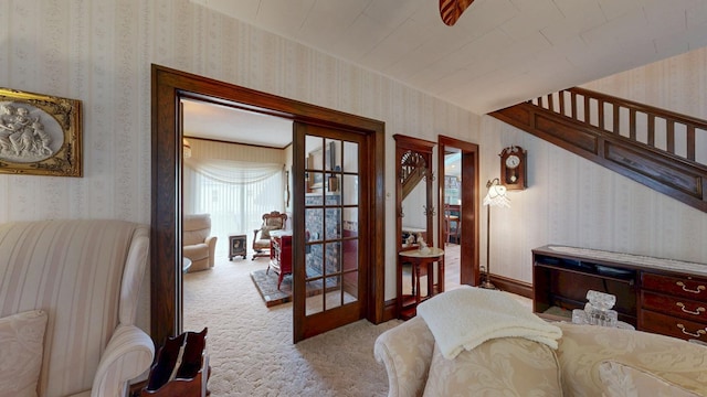 402 Main St, Racine, MN 55967 - living area with wallpapered walls and carpet flooring