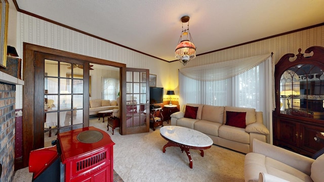 402 Main St, Racine, MN 55967 - living room with ornamental molding, wallpapered walls, carpet flooring, and a fireplace