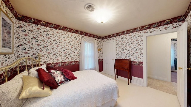 402 Main St, Racine, MN 55967 - bedroom featuring wallpapered walls, carpet floors, and baseboards