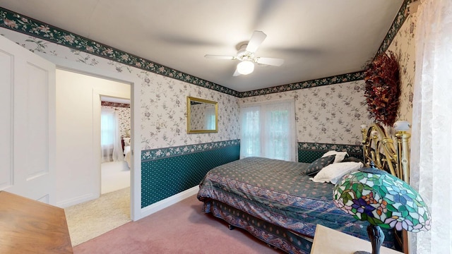 402 Main St, Racine, MN 55967 - carpeted bedroom featuring wallpapered walls and ceiling fan