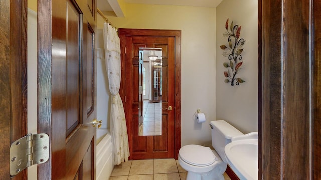 402 Main St, Racine, MN 55967 - full bathroom with toilet, tile patterned floors, and a tub to relax in