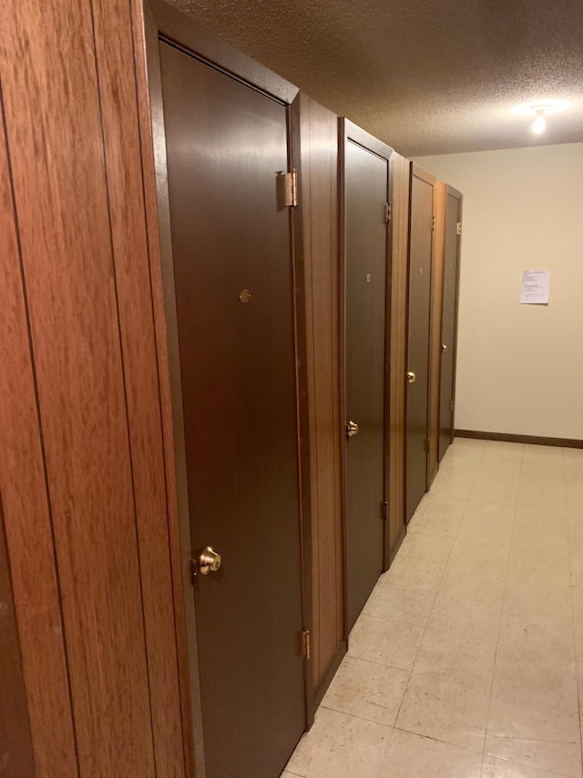 2800 Hillsboro Ave N Unit 316, New Hope, MN 55427 - hall featuring a textured ceiling
