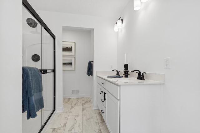 7572 Norway Ln, Lino Lakes, MN 55038 - full bathroom with marble finish floors, a shower stall, vanity, and baseboards