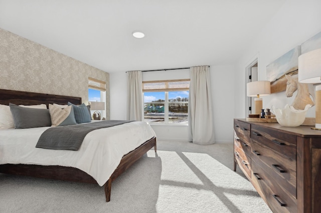 7572 Norway Ln, Lino Lakes, MN 55038 - bedroom featuring wallpapered walls, light carpet, and baseboards