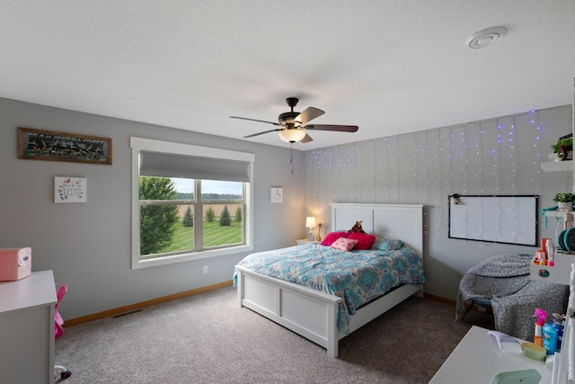 6339 140th Ave SE, Clear Lake, MN 55319 - carpeted bedroom featuring baseboards and ceiling fan