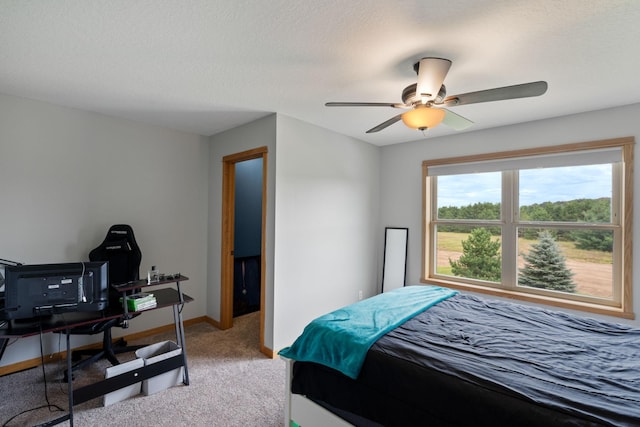 6339 140th Ave SE, Clear Lake, MN 55319 - bedroom featuring light colored carpet, a desk, and ceiling fan
