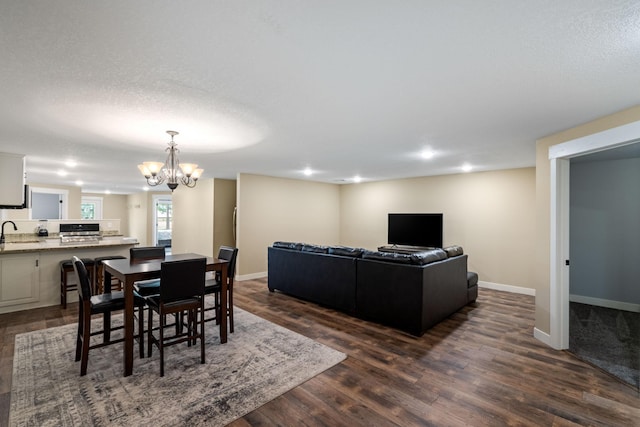 6339 140th Ave SE, Clear Lake, MN 55319 - dining space with a chandelier, dark wood-type flooring, and recessed lighting