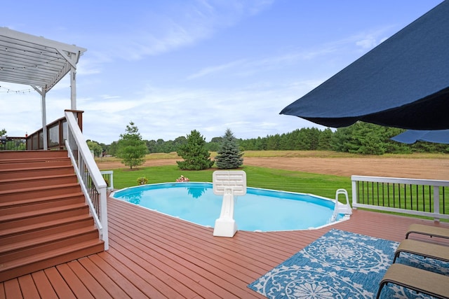 6339 140th Ave SE, Clear Lake, MN 55319 - swimming pool with a wooden deck, a lawn, stairs, and a pergola
