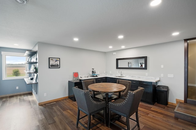 6339 140th Ave SE, Clear Lake, MN 55319 - dining space featuring dark wood finished floors, wet bar, and recessed lighting