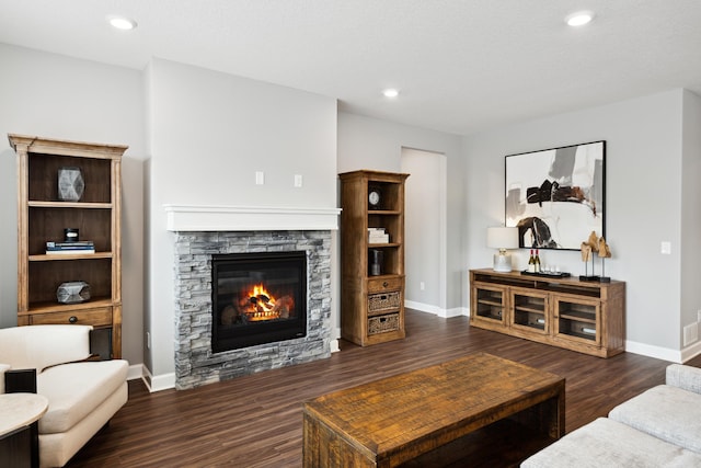 7665 Swan St, Lino Lakes, MN 55038 - living area featuring a fireplace, wood finished floors, and recessed lighting