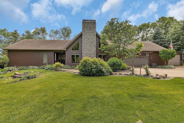 72959 235th St, Dassel, MN 55325 - view of front of home with concrete driveway, a front lawn, an attached garage, and a chimney