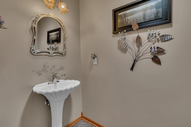 72959 235th St, Dassel, MN 55325 - bathroom with a chandelier and baseboards