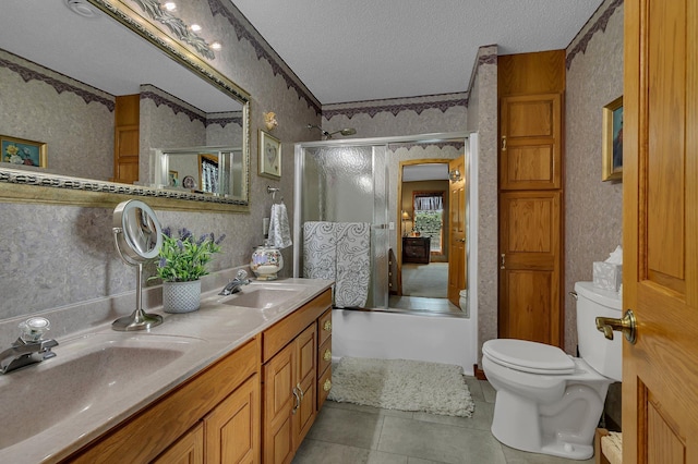 72959 235th St, Dassel, MN 55325 - bathroom featuring a textured ceiling, wallpapered walls, tile patterned flooring, double vanity, and shower / bath combination with glass door