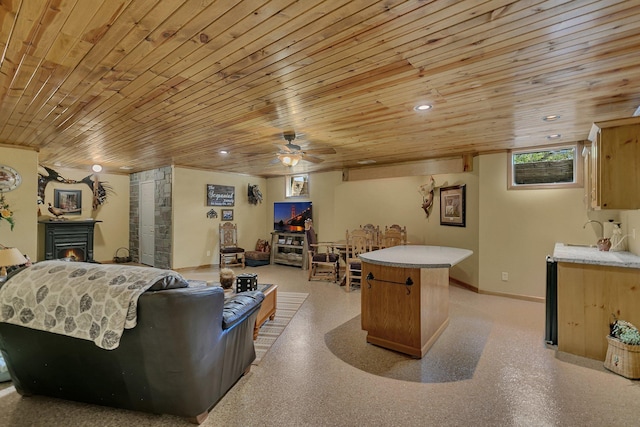 72959 235th St, Dassel, MN 55325 - living area featuring wooden ceiling, ceiling fan, a lit fireplace, and recessed lighting
