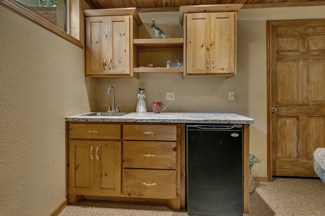 72959 235th St, Dassel, MN 55325 - kitchen with light carpet, fridge, light countertops, open shelves, and a textured wall
