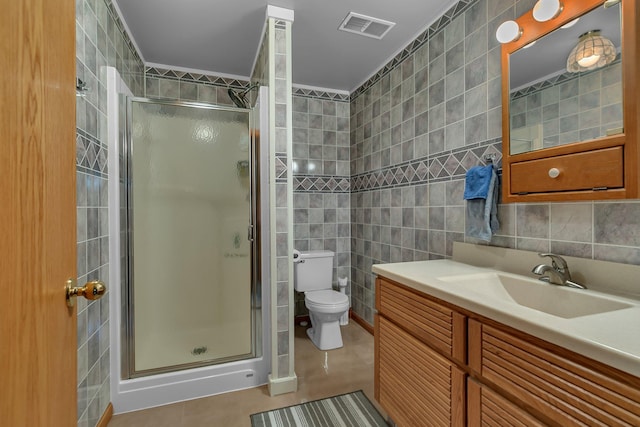 72959 235th St, Dassel, MN 55325 - full bathroom with tile walls, a stall shower, vanity, and tile patterned flooring