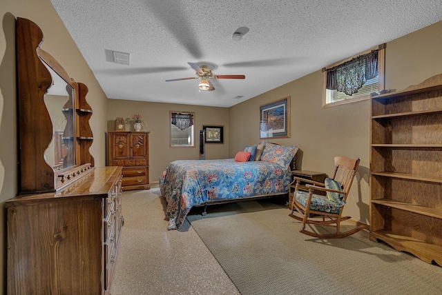 72959 235th St, Dassel, MN 55325 - bedroom with a textured ceiling, ceiling fan, and light colored carpet