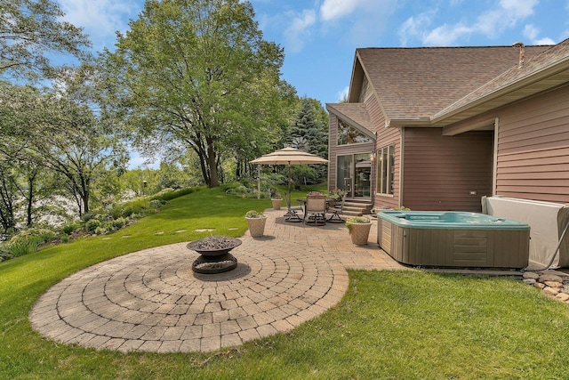 72959 235th St, Dassel, MN 55325 - view of grassy yard with a hot tub, a patio area, and an outdoor fire pit