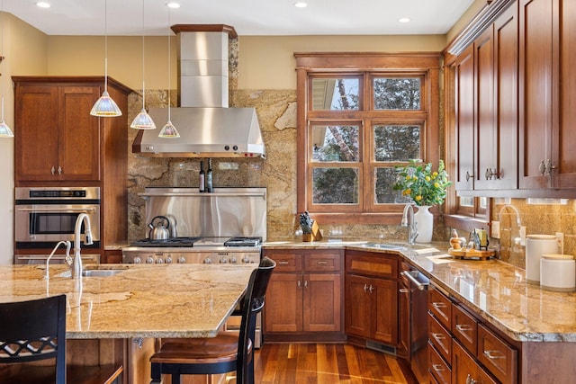 12159 Quail Avenue Ln N, Stillwater, MN 55082 - kitchen with wall chimney exhaust hood, a sink, wood finished floors, stainless steel dishwasher, and recessed lighting