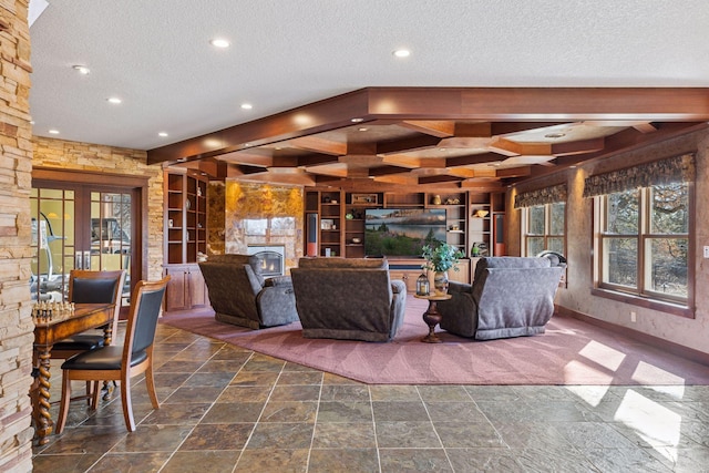 12159 Quail Avenue Ln N, Stillwater, MN 55082 - living room with a textured ceiling, built in features, stone tile flooring, baseboards, and recessed lighting