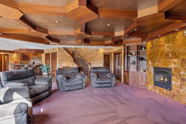12159 Quail Avenue Ln N, Stillwater, MN 55082 - living room with carpet floors, a fireplace, stairs, beam ceiling, and recessed lighting