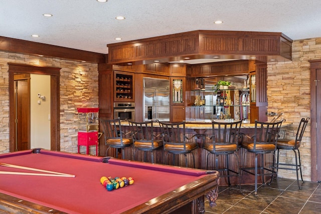 12159 Quail Avenue Ln N, Stillwater, MN 55082 - game room with pool table, a community bar, a textured ceiling, and recessed lighting