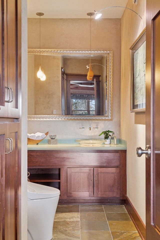 12159 Quail Avenue Ln N, Stillwater, MN 55082 - bathroom with vanity, toilet, and baseboards